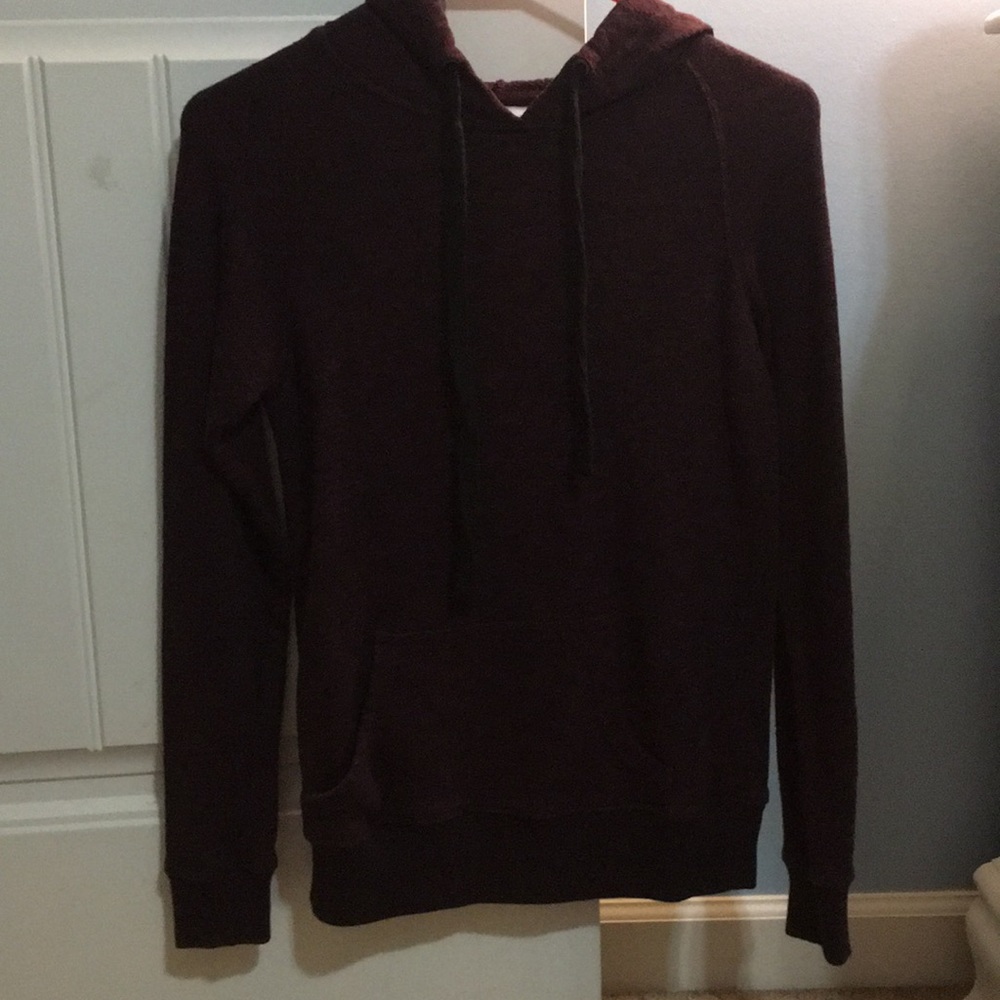 Long sleeve maroon hoodie.